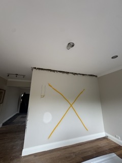 Wall removal decoupling the old combined wet area.